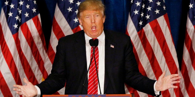 Republican U.S. presidential candidate Donald Trump responds to a speech attacking his candidacy by former Republican presidential nominee Mitt Romney during a Trump campaign rally in Portland, Maine, March 3, 2016. REUTERS/Joel Page