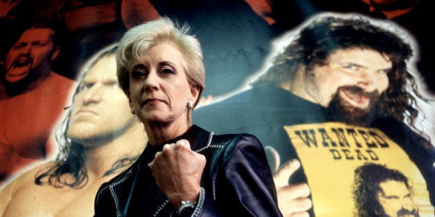 362424 05: Linda McMahon, President and CEO of the World Wrestling Federation poses for a portrait with the federation poster