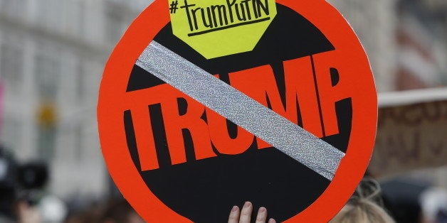 MANHATTAN, NEW YORK CITY, NEW YORK, UNITED STATES - 2016/12/12: Hundreds of activists, mostly women, gathered in front of Trump International in Columbus Circle for a 'Not My President!' rally and march against the inauguration of President-elect Donald Trump. After speeches from protesters that included playwright & activist Eve Ensler, activists marched across 59th Street to Trump Tower on 5th Avenue. (Photo by Andy Katz/Pacific Press/LightRocket via Getty Images)