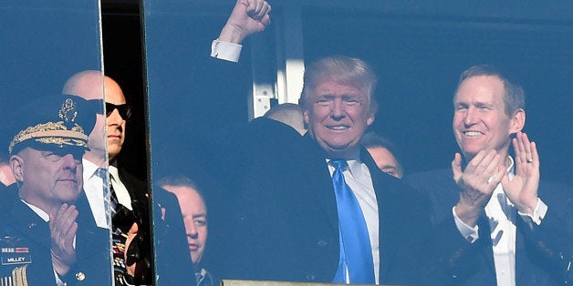 Dec 10, 2016; Baltimore, MD, USA; United States of America president elect Donald Trump waves to the crowd from a suit durin