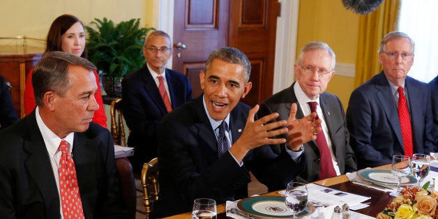 U.S. President Barack Obama (2nd L) hosts a luncheon for bi-partisan Congressional leaders in the Old Family Dining Room at the White House in Washington, November 7, 2014. From L-R are Speaker of the House John Boehner, Obama, Senate Majority Leader Harry Reid, and Senate Minority Leader Mitch McConnell. REUTERS/Larry Downing (UNITED STATES - Tags: POLITICS TPX IMAGES OF THE DAY)