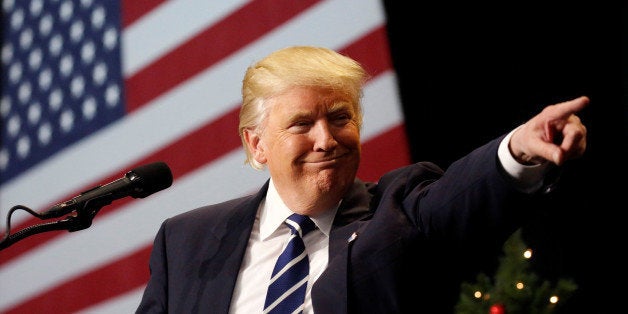 U.S. President-elect Donald Trump speaks at the USA Thank You Tour event at the Wisconsin State Fair Exposition Center in West Allis, Wisconsin, U.S., December 13, 2016. REUTERS/Shannon Stapleton