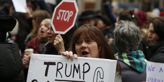 MANHATTAN, NEW YORK CITY, NEW YORK, UNITED STATES - 2016/12/12: Hundreds of activists, mostly women, gathered in front of Trump International in Columbus Circle for a 'Not My President!' rally and march against the inauguration of President-elect Donald Trump. After speeches from protesters that included playwright & activist Eve Ensler, activists marched across 59th Street to Trump Tower on 5th Avenue. (Photo by Andy Katz/Pacific Press/LightRocket via Getty Images)