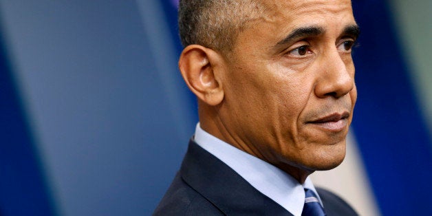 U.S. President Barack Obama pauses as he participates in his last news conference of the year at the White House in Washington, U.S., December 16, 2016. REUTERS/Jonathan Ernst