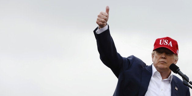 U.S. President-elect Donald Trump gestures as he speaks during a USA Thank You Tour event in Mobile, Alabama, U.S., December 17, 2016. REUTERS/Lucas Jackson