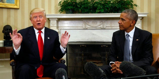 U.S. President Barack Obama (R) meets with President-elect Donald Trump to discuss transition plans in the White House Oval Office in Washington, U.S., November 10, 2016. REUTERS/Kevin Lamarque