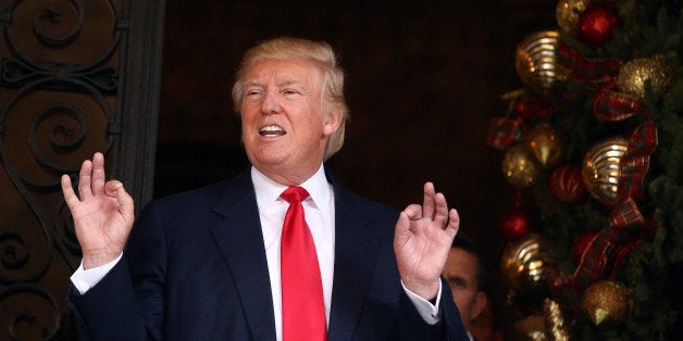 U.S. President-elect Donald Trump talks to members of the media at Mar-a-Lago estate in Palm Beach, Florida, U.S., December 2