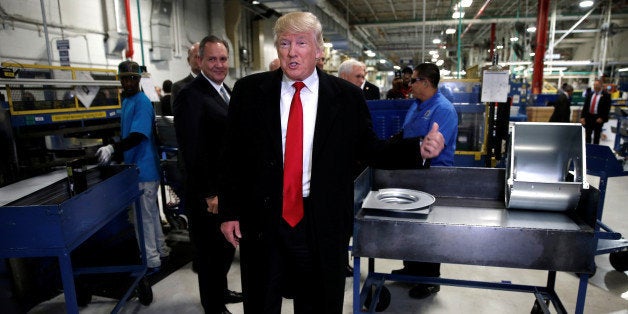 U.S. President-elect Donald Trump speaks to members of the news media as he tours a Carrier factory in Indianapolis, Indiana, U.S., December 1, 2016. REUTERS/Mike Segar