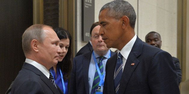 Russian President Vladimir Putin (L) meets with U.S. President Barack Obama on the sidelines of the G20 Summit in Hangzhou, China, September 5, 2016. Sputnik/Kremlin/Alexei Druzhinin/via REUTERS ATTENTION EDITORS - THIS IMAGE WAS PROVIDED BY A THIRD PARTY. EDITORIAL USE ONLY. TPX IMAGES OF THE DAY 