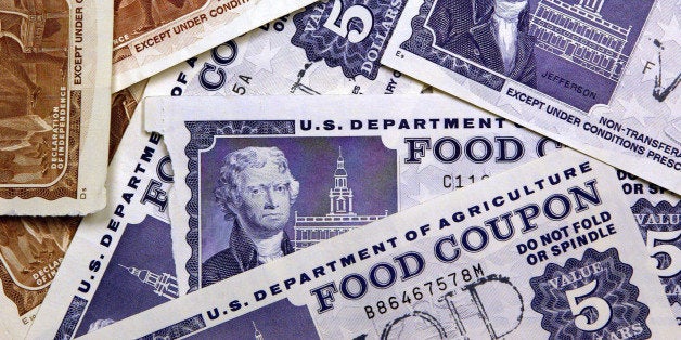 SKOKIE, IL - JUNE 24: Older, traditional food stamps are displayed June 24, 2004 at an Illinois Department of Human Services office in Skokie, Illinois. Agriculture Secretary Ann M. Veneman has announced all 50 states and the U.S. territories now provide Food Stamp Program benefits with EBT (Electronic Benefits Transfer) cards instead of the traditional paper coupon stamps. (Photo by Tim Boyle/Getty Images)