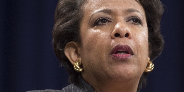US Attorney General Loretta Lynch speaks during a Naturalization Ceremony for new US Citizens at the Department of Justice in