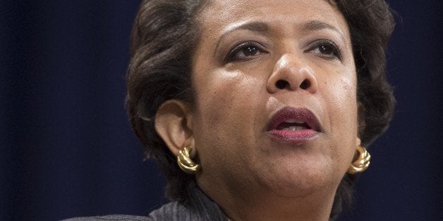 US Attorney General Loretta Lynch speaks during a Naturalization Ceremony for new US Citizens at the Department of Justice in Washington, DC, November 17, 2016. / AFP / SAUL LOEB (Photo credit should read SAUL LOEB/AFP/Getty Images)