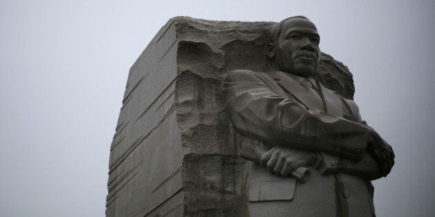 The Martin Luther King Jr. Memorial is pictured during a steady rain in Washington January 18, 2015. Monday will mark the U.S. national holiday in memory of the fallen civil rights leader, who was assassinated in 1968. REUTERS/Jonathan Ernst (UNITED STATES - Tags: POLITICS ANNIVERSARY)