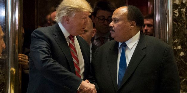 NEW YORK, NY - JANUARY 16: (L to R) President-elect Donald Trump shakes hands with Martin Luther King III after their meeting at Trump Tower, January 16, 2017 in New York City. Trump will be inaugurated as the next U.S. President this coming Friday. (Photo by Drew Angerer/Getty Images)