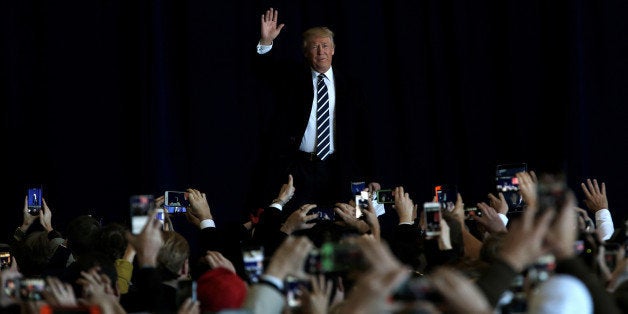 U.S. President-elect Donald Trump arrives to speak during a "Thank You USA" tour rally in Baton Rouge, Louisiana, U.S., Decem