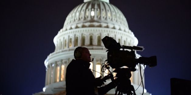 The US Capitol Building is pictured as media gather on January 20, 2017 in Washington, DC.
Donald Trump will be sworn in as