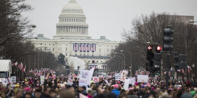 WASHINGTON, USA - JANUARY 21: Protesters attend the Women's March to protest President Donald Trump in Washington, USA on January 21, 2017. (Photo by Samuel Corum/Anadolu Agency/Getty Images)