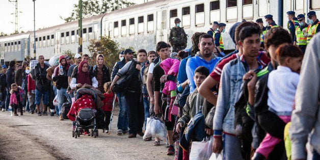 Zakany, Hungary - October 5, 2015: War refugees at Zakany Railway Station, Refugees are arriving constantly to Hungary on the