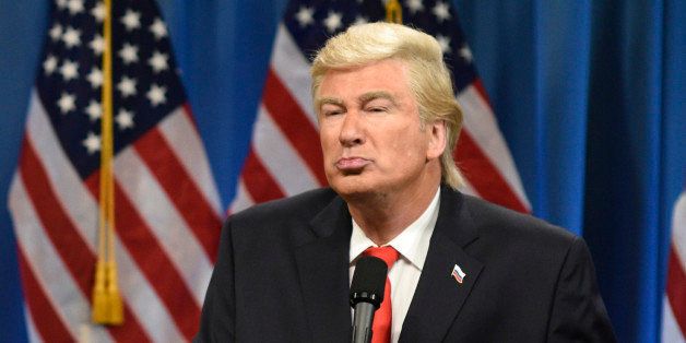 SATURDAY NIGHT LIVE -- 'Felicity Jones' Episode 1715 -- Pictured: (l-r) Cecily Strong as a lawyer and Alec Baldwin as President Elect Donald J. Trump during the Trump Press Conference Cold Open on January 14th, 2017 -- (Photo by: Will Heath/NBC/NBCU Photo Bank via Getty Images)
