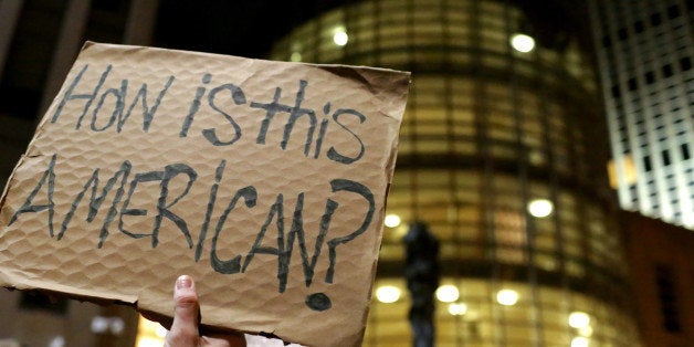 BROOKLYN - JANUARY 28: A crowd of protesters gathers outside of the Brooklyn Federal Courthouse as a judge hears a challenge against President Donald Trump's executive ban on immigration from several Muslim countries, on January 28, 2017 in Brooklyn. The judge issued an emergency stay on part of Trump's executive order, ruling that sending refugees stopped at U.S. airports back to their countries would be harmful. (Photo by Yana Paskova/Getty Images)