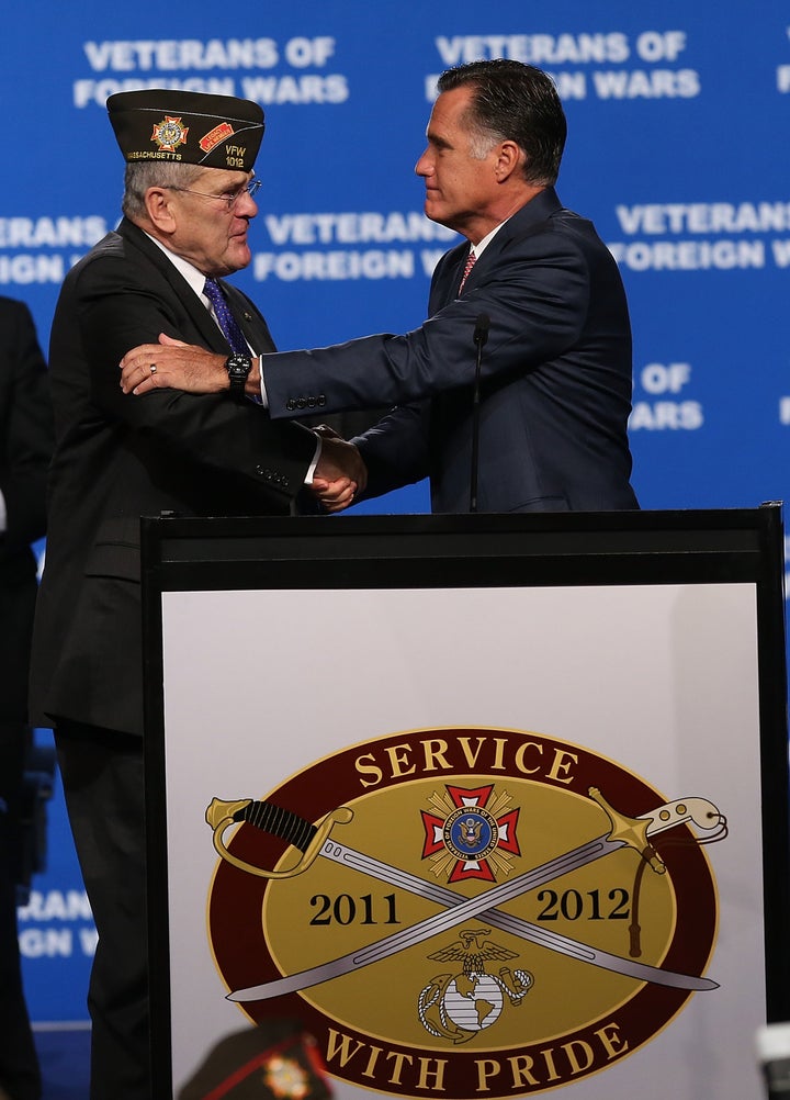 RENO, NV - JULY 24: Republican presidential candidate and former Massachusetts Gov. Mitt Romney (R) greets Veterans of Foreign Wars Commander-in-Chief Richard L. DeNoyer before speaking during the 113th National Convention of the Veterans of Foreign Wars of the U.S. at the Reno-Sparks Convention Center on July 24, 2012 in Reno, Nevada. Mitt Romney spoke to veterans at the 113th National Convention of the Veterans of Foreign Wars before he leaves to London to kick off a six-day foreign trip to England, Israel and Poland. (Photo by Justin Sullivan/Getty Images)