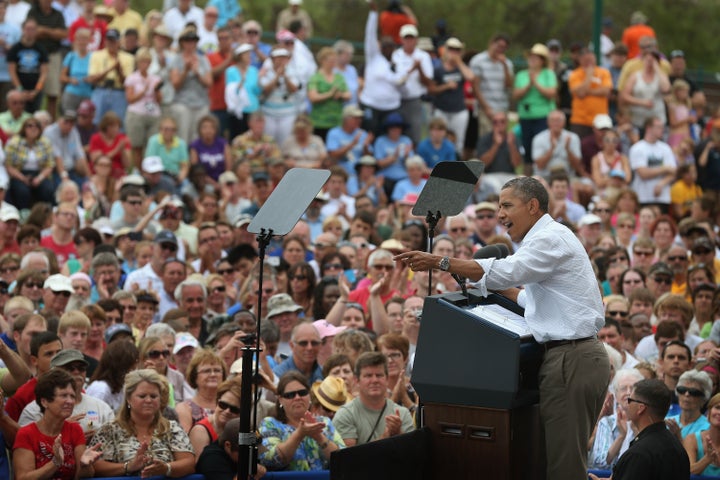 DUBUQUE, IA - AUGUST 15: U.S. President Barack Obama speaks at a campaign rally August 15, 2012 in Dubuque, Iowa. The stop was one of two scheduled for today as the president wraps up a three-day, nine-city campaign trip across Iowa. (Photo by Scott Olson/Getty Images)