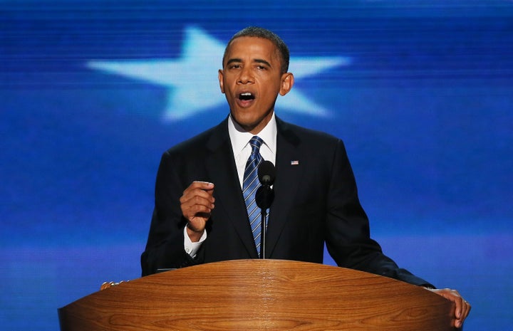 CHARLOTTE, NC - SEPTEMBER 06: Democratic presidential candidate, U.S. President Barack Obama speaks on stage to accept the nomination for president during the final day of the Democratic National Convention at Time Warner Cable Arena on September 6, 2012 in Charlotte, North Carolina. The DNC, which concludes today, nominated U.S. President Barack Obama as the Democratic presidential candidate. (Photo by Alex Wong/Getty Images)