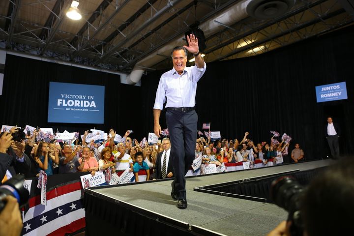 MIAMI, FL - SEPTEMBER 19: Republican presidential candidate, former Massachusetts Gov. Mitt Romney waves to supporters during a Juntos Con Romney Rally at the Darwin Fuchs Pavilion, on September 19, 2012 in Miami, Florida. Romney continues to campaign for votes around the country. (Photo by Joe Raedle/Getty Images)