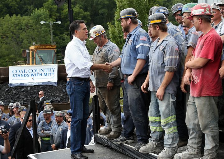 BEALLSVILLE, OH - AUGUST 14: Republican presidential candidate and former Massachusetts Governor Mitt Romney greets coal miners during a campaign rally at American Energy Corportation on August 14, 2012 in Beallsville, Ohio. Mitt Romney is wrapping up his multi state bus tour with campaign events in Ohio. (Photo by Justin Sullivan/Getty Images)