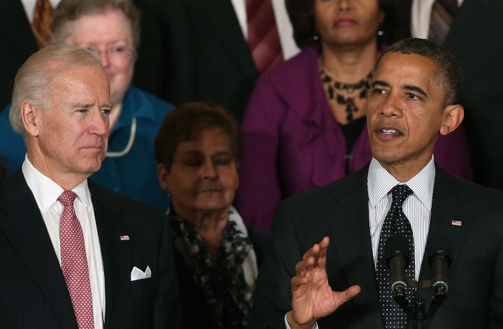 WASHINGTON, DC - NOVEMBER 09: U.S. President Barack Obama (R) speaks to the media in East Room of the White House, as Vice President Joe Biden listens on November 9, 2012 in Washington, DC. President Obama said he invited Congressional Republican leaders to come to the White House to discuss ways of the avoiding the so-called fiscal cliff at the end of the year. (Photo by Mark Wilson/Getty Images)