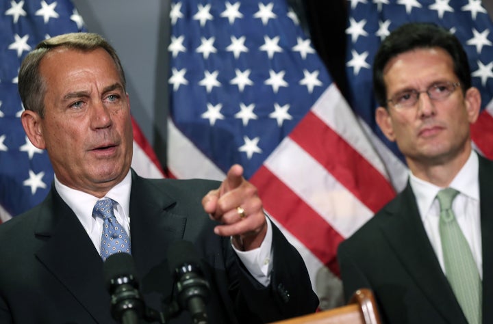 WASHINGTON, DC - SEPTEMBER 20: U.S. Speaker of the House John Boehner (R-OH) speaks at a press conference as Rep. Eric Cantor (R-VA) (R) listens on Capitol Hill September 20, 2012 in Washington, DC. Republican leaders met for their weekly conference meeting prior to holding their press conference. (Photo by Win McNamee/Getty Images)