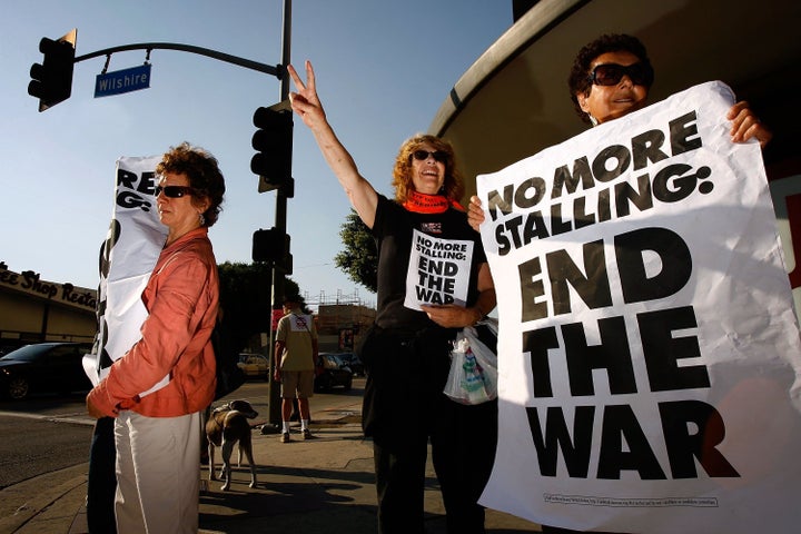 LOS ANGELES, CA - JULY 17: Protesters organized by MoveOn.org hold a 'counter-filibuster' demonstration, calling upon the U.S Senate to end an expected Republican filibuster to block the vote on passage of legislation that sets a timetable for the exit of U.S troops from Iraq, on July 17, 2007 in Los Angeles, California. The proposed legislation would require President Bush to begin bringing the troops home within the next 120 days and complete the task by April 2008. (Photo by David McNew/Getty Images)