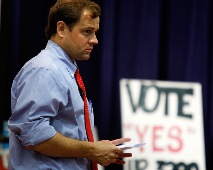 FORK UNION, VA - AUGUST 17: U.S. Rep. Tom Perriello (D-VA) listens during a town hall meeting on universal health care at Fluvanna Middle School August 17, 2009 in Fork Union, Virginia. Congressional members from across the country have returned to their own district to listen to voters' opinions on healthcare reform. (Photo by Alex Wong/Getty Images)