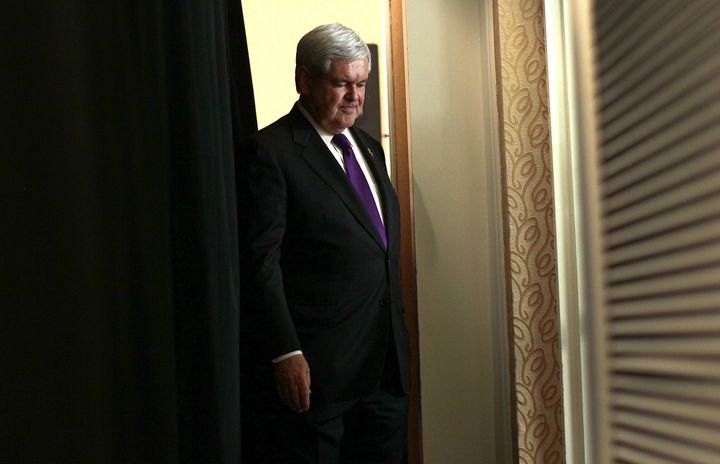 ARLINGTON, VA - MAY 02: Former Speaker of the House Newt Gingrich walks backstage after he announced he is suspending his campaign for the Republican presidential nomination May 2, 2012 in Arlington, Virginia. Gingrich said he decided to leave the race after his rival, former Massachusetts Gov. Mitt Romney, surged ahead in recent primary elections. Gingrich plans to campaign for his former rival with an official endorsement to come in the next few weeks. (Photo by Win McNamee/Getty Images)