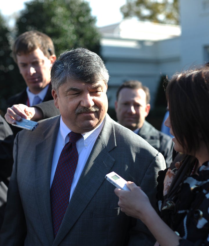 American Federation of Labor and Congress of Industrial Organizations (AFL–CIO) President Richard Trumka (L) speaks to reporters November 13, 2012 outside of the West Wing of the White House following a meeting he and labor leaders had with US President Barack Obama on the economy and the deficit. AFP PHOTO/Mandel NGAN (Photo credit should read MANDEL NGAN/AFP/Getty Images)