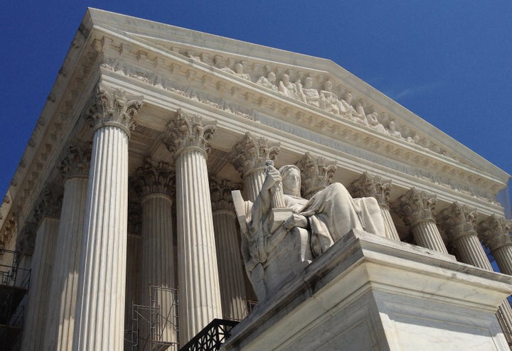 WASHINGTON, DC - JUNE 27: The U.S. Supreme Court building June 27, 2012 in Washington, DC. The high court could hand down a landmark ruling on the Affordable Care Act as early as Thursday. (Photo by Chip Somodevilla/Getty Images)