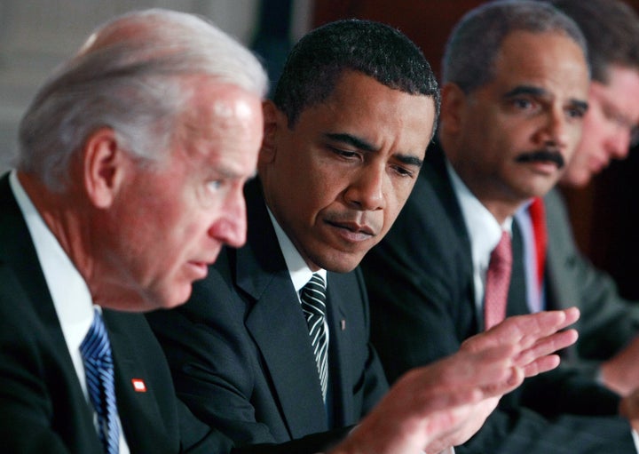 WASHINGTON - JUNE 8: President Barack Obama (C) and Attorney General Eric Holder (R) listen to Vice President Joseph Biden speak during a Cabinet meeting at the White House June 8, 2009 in Washington, DC. Vice President Biden announced a 'Roadmap to Recovery' plan to hasten the realization of the American Recovery and Reinvestment Act. (Photo by Mark Wilson/Getty Images)