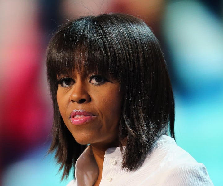 WASHINGTON, DC - JANUARY 19: The First Lady Michelle Obama speaks during the children's concert at the Washington Convention Center to celebrate military families on January 19, 2013 in Washington, DC. The U.S. capital is preparing for the second inauguration of U.S. President Barack Obama, which will take place on January 21. (Photo by Joe Raedle/Getty Images)