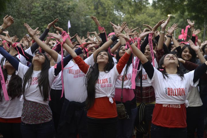 Indian students dance as they take part in a One Billion Rising rally in New Delhi on February 14, 2013. Indians were at the forefront of global protests on Thursday in the One Billion Rising campaign for women's rights, galvanised by the recent fatal gangrape that shocked the country. AFP PHOTO/SAJJAD HUSSAIN (Photo credit should read SAJJAD HUSSAIN/AFP/Getty Images)