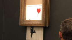 Banksy Artwork Shreds Itself After Being Sold At
