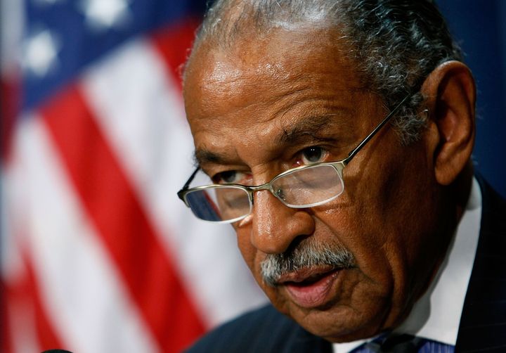 WASHINGTON - SEPTEMBER 12: House Judiciary Chairman John Conyers (D-MI) (L) talks about helping hurricane ravaged Haiti during a news conference on Capitol Hill September 10, 2008 in Washington DC. Conyers called on the Bush administration and the international community to provide immediate aid to the country that that was hit hard by Hurricane Ike. (Photo by Mark Wilson/Getty Images)