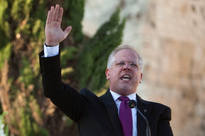 JERUSALEM, ISRAEL - AUGUST 24: (ISRAEL OUT) U.S. conservative broadcaster Glenn Beck hosts a rally near the Western Wall, on August 24, 2011 in Jerusalem's Old City, Israel. The event, under the slogan 'Restoring Courage', was attended by hundreds of his evangelical Christian supporters, whilst many who oppose his right-wing views protested outside. (Photo by Uriel Sinai/Getty Images)