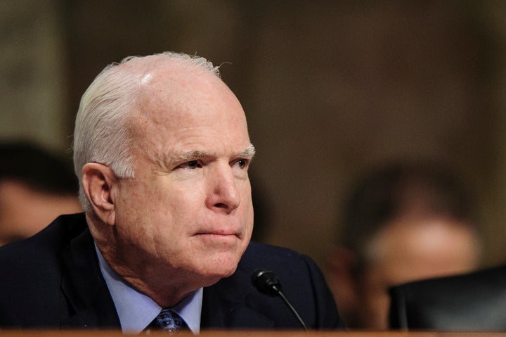 Senator John McCain (R-AZ) listens as former Senator Chuck Hagel (R-NE) testifies before the Senate Armed Services Committee, Thursday, January 31, 2013 in Washington, D.C. (Pete Marovich/MCT via Getty Images)