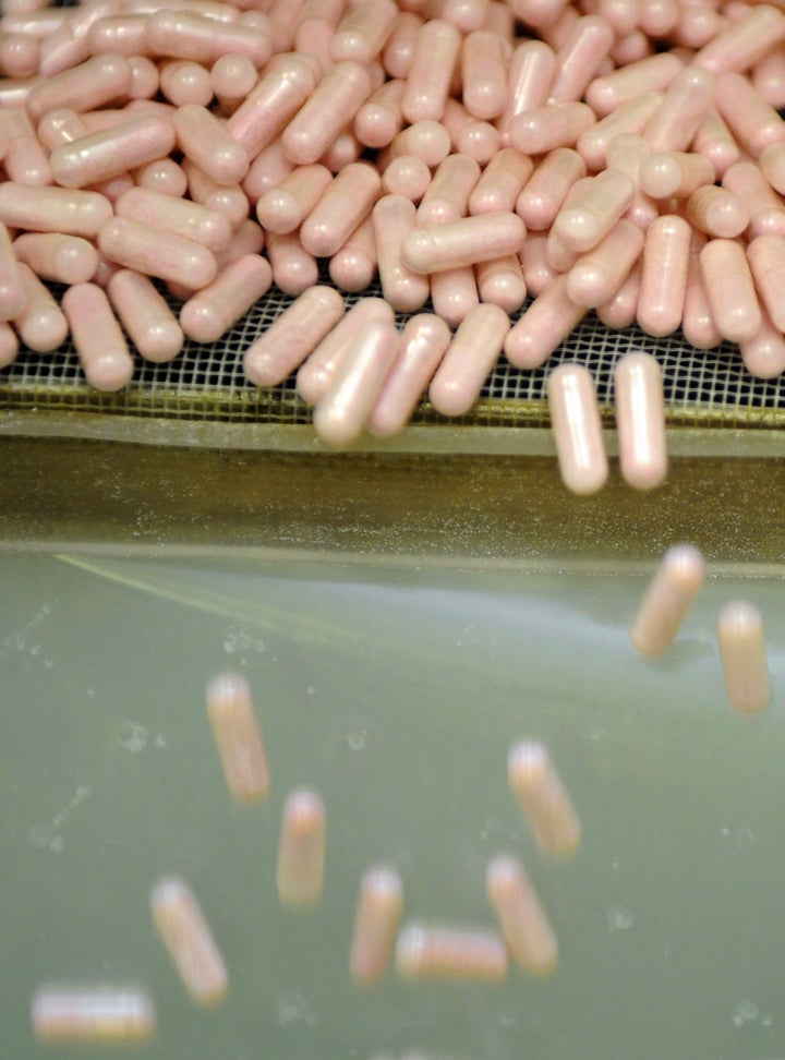 Capsules of food supplements are seen at the end of the production chain at the Juva Sante Laboratoires plant, on March 13, 2013 in Forbach, eastern France. French Juva Sante Laboratoires company make pharmaceutical products for their Juvamine brand (food supplements) and for their Mercurochrome brand (cosmetic and hygiene). AFP PHOTO / JEAN-CHRISTOPHE VERHAEGEN (Photo credit should read JEAN-CHRISTOPHE VERHAEGEN/AFP/Getty Images)