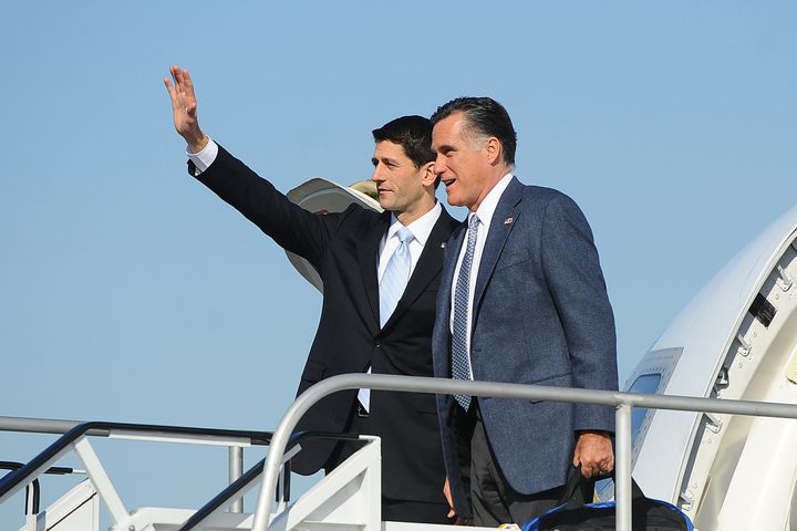 US Republican presidential candidate Mitt Romney and runing mate Paul Ryan(L) arrive in Cleveland, Ohio, November 6, 2012. Republican presidential hopeful Mitt Romney cast his ballot Tuesday in the US elections with his wife Ann before heading to Ohio and Pennsylvania for one last push to get out the vote. The Romneys voted at the Beech Street Center in the town of Belmont, Massachusetts, the community center where they voted in the Republican primary in March. AFP PHOTO/Emmanuel DUNAND (Photo credit should read EMMANUEL DUNAND/AFP/Getty Images)