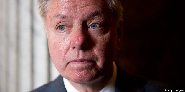 UNITED STATES - MARCH 12: Sen. Lindsey Graham, R-S.C., speaks with reporters before the senate luncheons in the Capitol. (Photo By Tom Williams/CQ Roll Call)