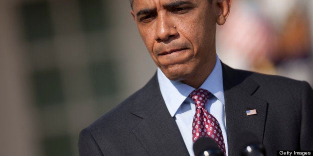 U.S. President Barack Obama talks about the shooting of Florida teenager Trayvon Martin as he introduces Jim Yong Kim, president of Dartmouth College, as a nominee to become president of the World Bank at the Rose Garden of the White House in Washington, D.C., U.S., on Friday, March 23, 2012. Kim was born in Seoul and is a U.S. citizen. He would succeed Robert Zoellick as the head of the bank. The bank made $57 billion loans in the last fiscal year. Photographer: Andrew Harrer/Bloomberg via Getty Images
