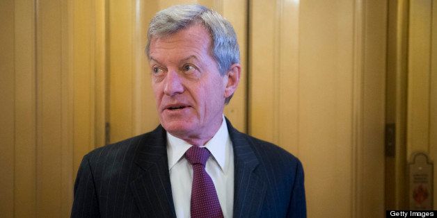 UNITED STATES - NOVEMBER 27: Sen. Max Baucus, D-Mont., speaks to a reporter as he leaves the Senate floor on Tuesday, Nov. 27, 2012. (Photo By Bill Clark/CQ Roll Call)