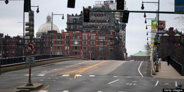 CAMBRIDGE, MA - APRIL 19: The Boston area is under lockdown as as a manhunt is underway for a suspect in the terrorist bombing of the 117th Boston Marathon earlier this week. The Mass. Avenue bridge has only a few pedestrians crossing. (Photo by Jonathan Wiggs/The Boston Globe via Getty Images)