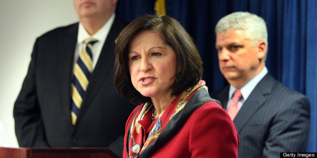 BOSTON - JANUARY 17: US Attorney Carmen Ortiz and members of the FBI and other law enforcement agencies including Boston Police Commissioner Ed Davis, left, and DA Dan Conley, announced the arrest of thirty Boston gang members charged with drug and firearms offenses. (Photo by John Tlumacki/The Boston Globe via Getty Images)